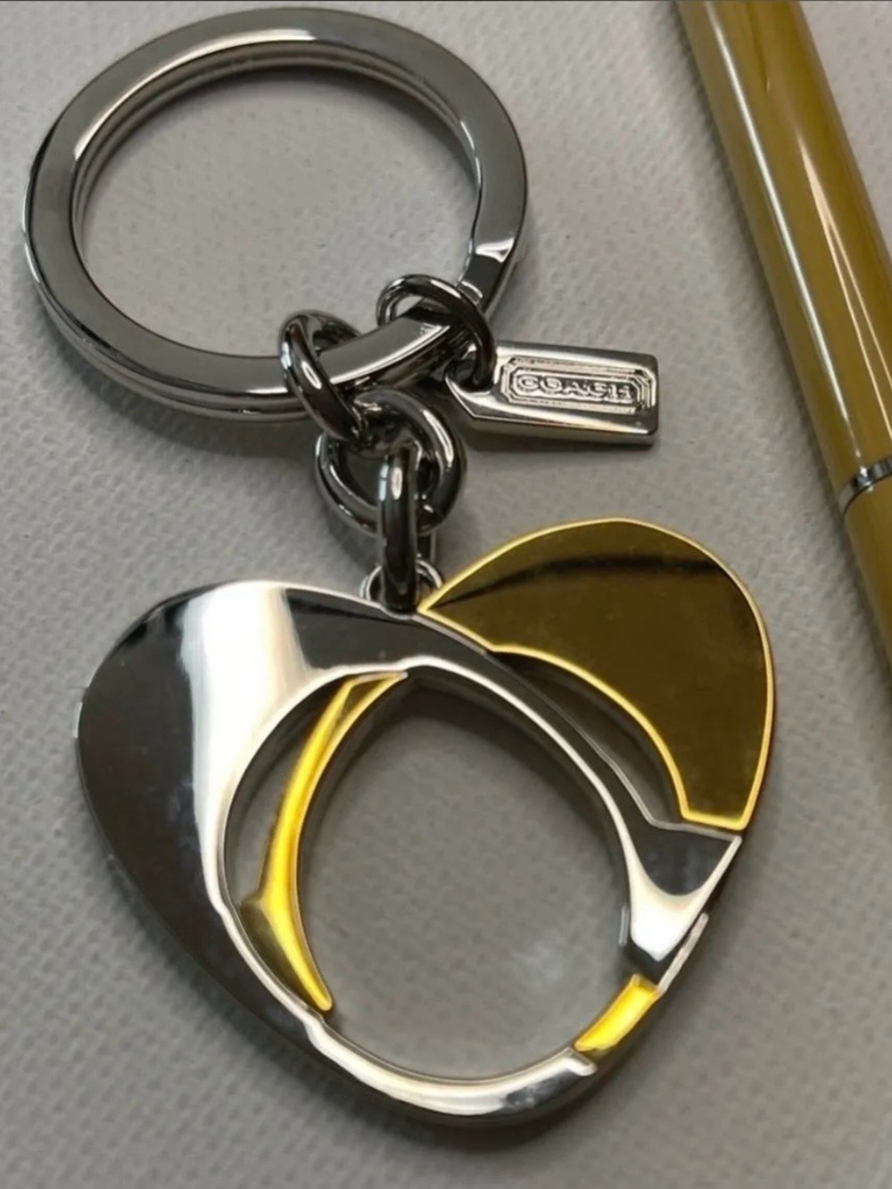 Coach Silver and Gold Heart
Keychain with Cream Coach Pen NWOT - Picture 2 of 5